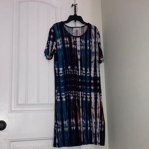 I’m sailing a dress. It has been worn. It was washed with downy and tied/Oxi